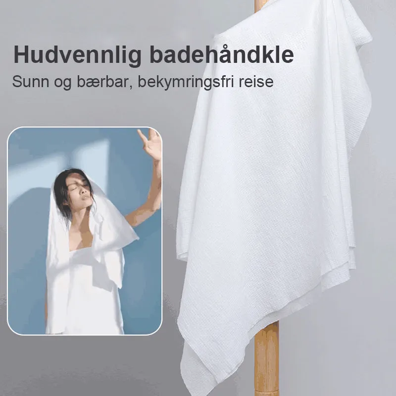 Disposable bath towel in compressed cotton